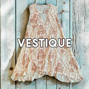 Cute Sleeveless top with front cutout flared bottom blouse size Small